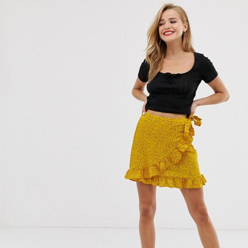 Glamorous yellow / black polka dot wrap mini skirt